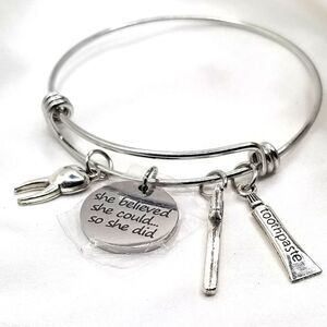 Silver toned dangle charm bangle cuff bracelet she believed she could so she did